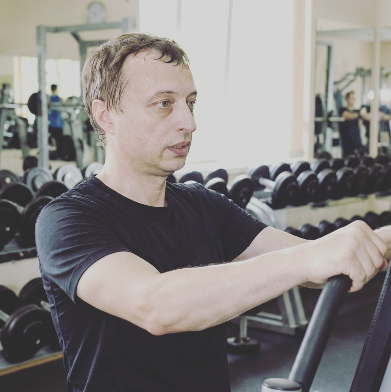 At the gym, mid-workout.